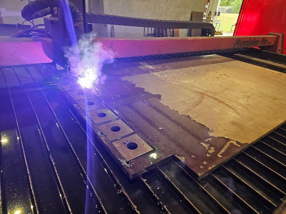 High-definition plasma cutting in progress on the 6x12 table